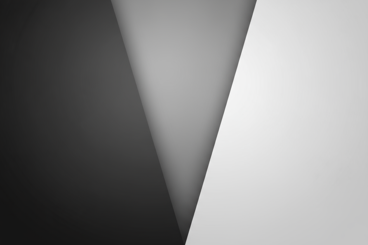 Create a minimal and elite aesthetic background image for a Shopify homepage.

Style: ultra-clean, modern, and sophisticated.

Use neutral tones — matte white, soft gray, or charcoal black.
Subtle soft shadows or gradients for depth, but no busy textures, no text, no objects.

The design should look premium, calm, and brand-ready — perfect behind homepage hero text like “Browse our latest products” and “Shop All.”

Keep the vibe Elite, minimal, aesthetic, and disciplined.
It should fit any category (beauty,